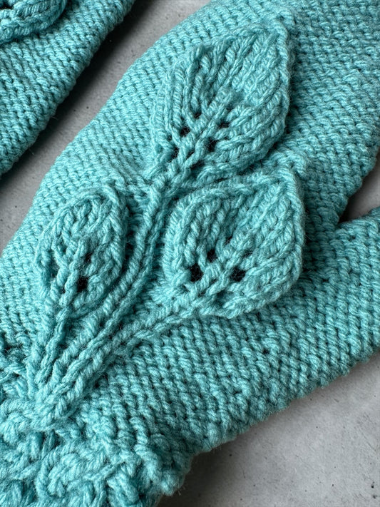 Hand knit mitts with a 3 leaf motif knitting pattern