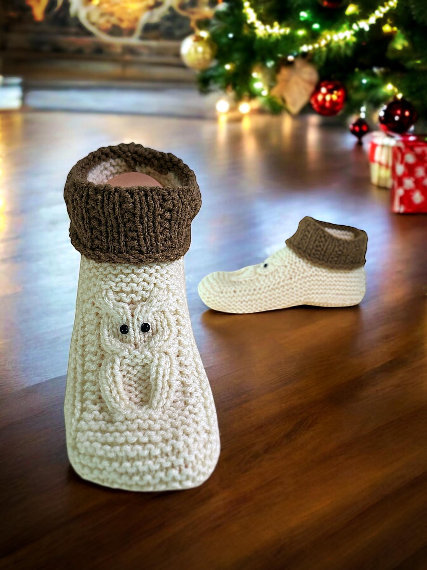 detailed stitch view of owl cable knitting pattern on slippers