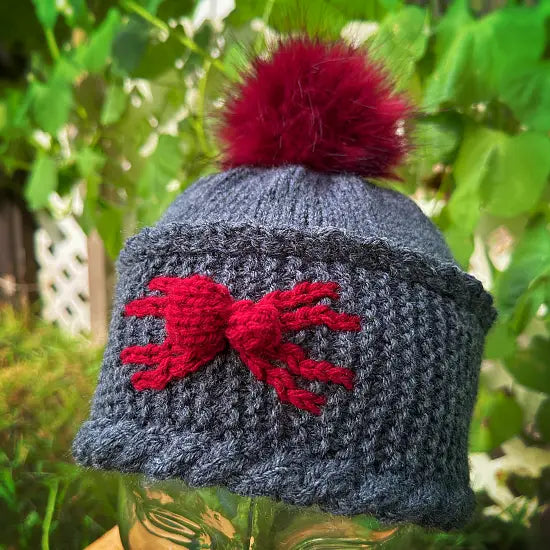 Knitted spider beanie pattern for Halloween and year-round wear
