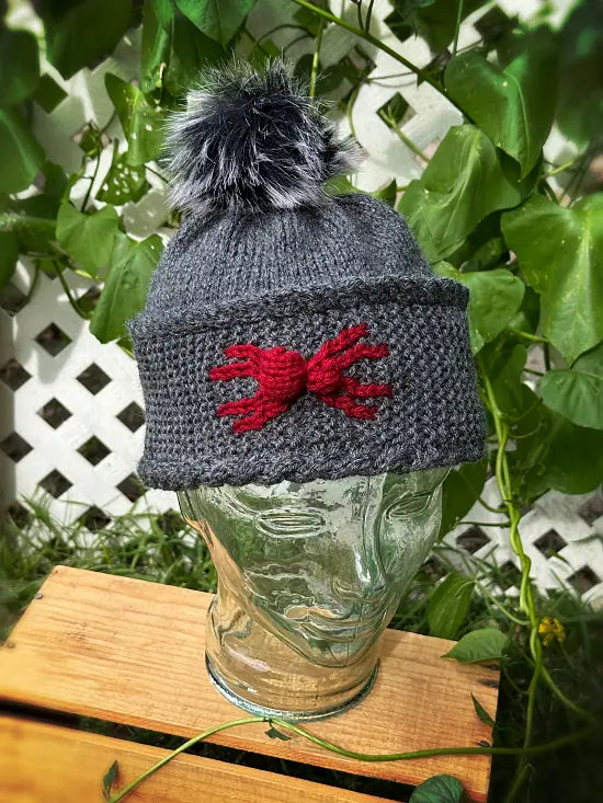 Halloween knitting pattern for a spider beanie and spooky winter hat