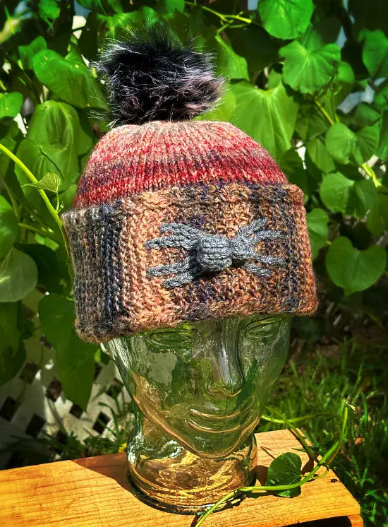 Spooky knitted spider hat perfect for Halloween or everyday wear